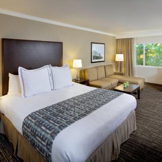 Best Western Plus Garden Court Inn | Fremont, California | King bedroom with couch