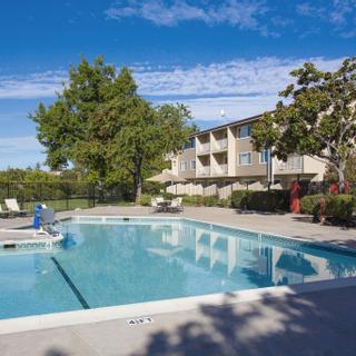 Best Western Plus Garden Court Inn | Fremont, California | Pool area with seating 